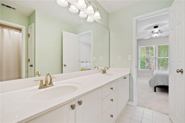 420 Big Bend Trl, Sugar Hill, GA 30518 - bathroom with double vanity, tile patterned floors, connected bathroom, baseboards, and a ceiling fan