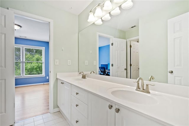 420 Big Bend Trl, Sugar Hill, GA 30518 - bathroom with double vanity, tile patterned flooring, and baseboards