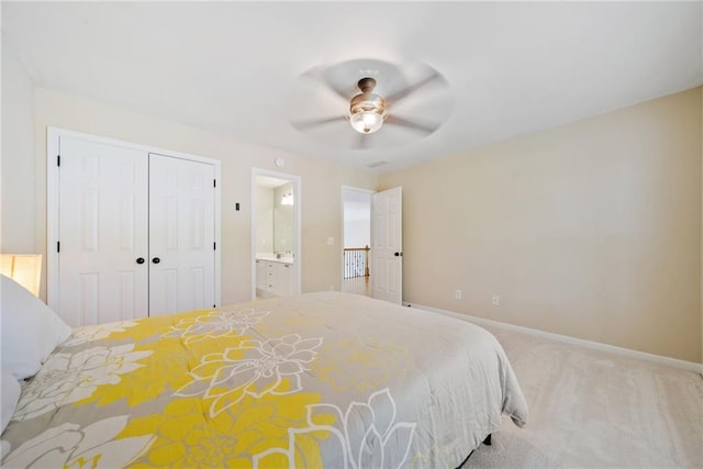 420 Big Bend Trl, Sugar Hill, GA 30518 - carpeted bedroom featuring a closet, baseboards, ceiling fan, and connected bathroom