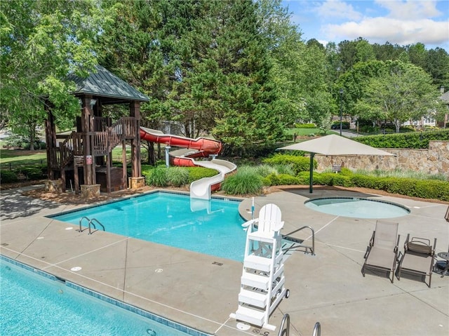 420 Big Bend Trl, Sugar Hill, GA 30518 - swimming pool with a water slide and a patio area