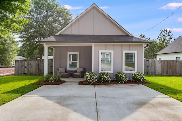 110 Chalfont Cir, Carrollton, GA 30117 - view of front of property with board and batten siding, an outdoor hangout area, and a patio