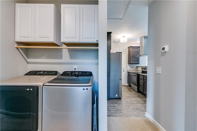 110 Chalfont Cir, Carrollton, GA 30117 - laundry room featuring washer and dryer, attic access, baseboards, and light wood-style flooring