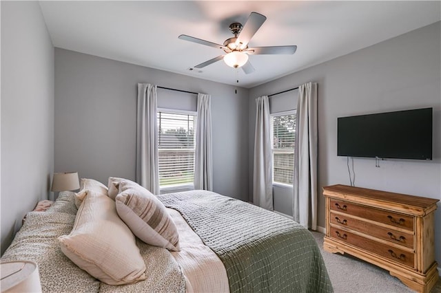 110 Chalfont Cir, Carrollton, GA 30117 - carpeted bedroom with multiple windows and a ceiling fan