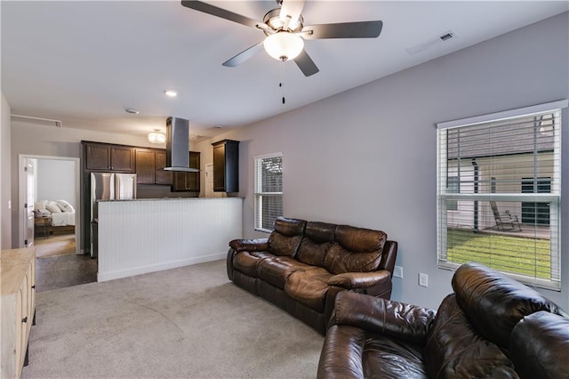 110 Chalfont Cir, Carrollton, GA 30117 - living room featuring ceiling fan, light colored carpet, and healthy amount of natural light