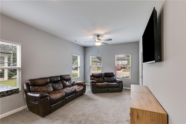 110 Chalfont Cir, Carrollton, GA 30117 - carpeted living area with ceiling fan, healthy amount of natural light, and baseboards