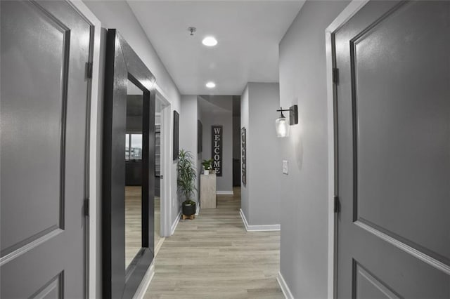 hallway featuring light wood-type flooring