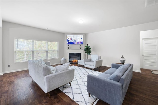 living room featuring dark hardwood / wood-style floors