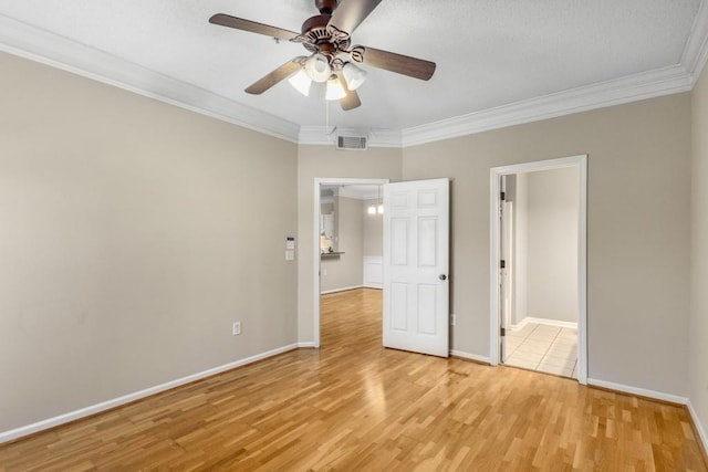 unfurnished bedroom with crown molding, ceiling fan, and light hardwood / wood-style flooring