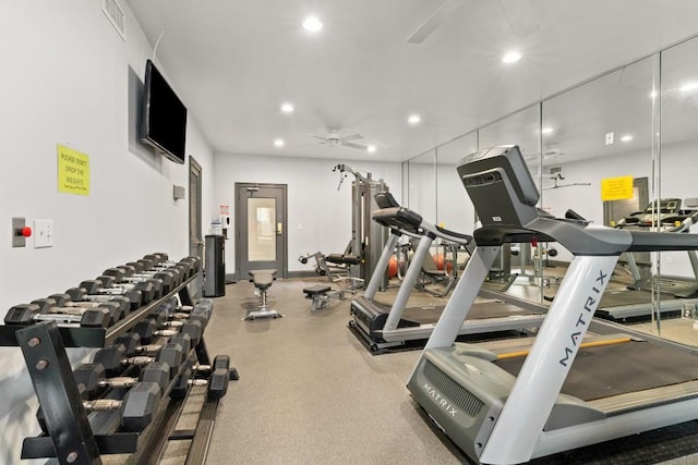 exercise room with ceiling fan