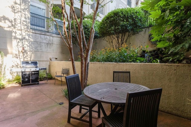 view of patio with a grill