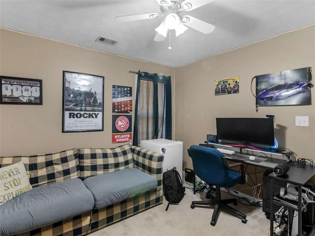 office featuring carpet flooring and ceiling fan