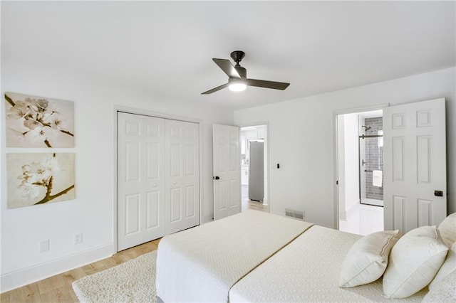 bedroom featuring light wood-type flooring and ceiling fan