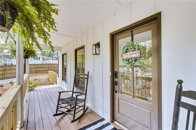 entryway with a wealth of natural light and light hardwood / wood-style floors