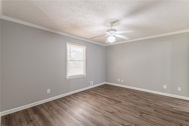 empty room featuring crown molding, a textured ceiling, dark wood-type flooring, and ceiling fan