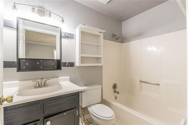 full bathroom with vanity, toilet, shower / bathing tub combination, and a textured ceiling