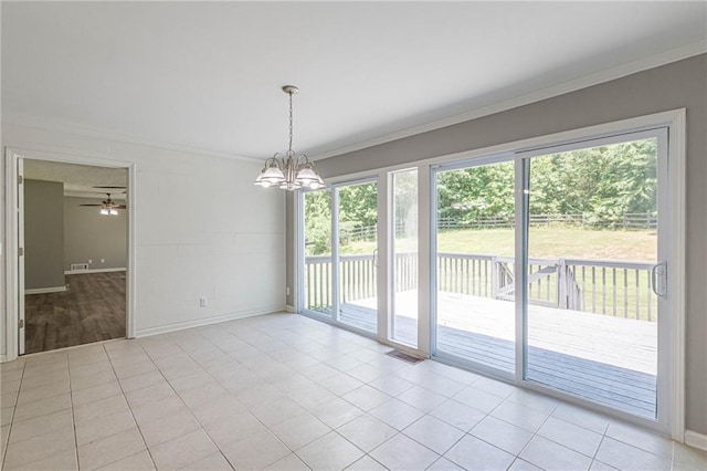 interior space featuring ornamental molding and ceiling fan with notable chandelier