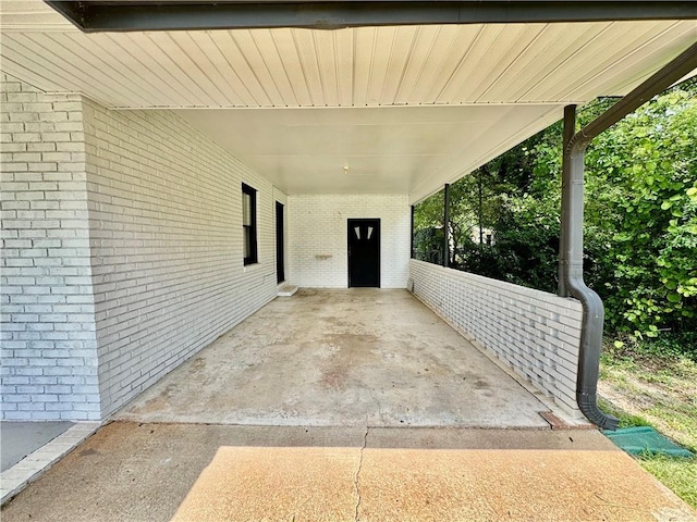 312 E Broad St, Winder, GA 30680 - view of patio / terrace featuring an attached carport