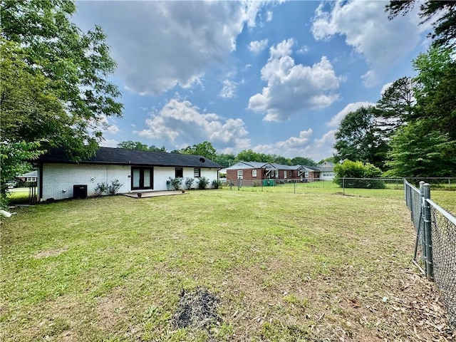 312 E Broad St, Winder, GA 30680 - view of yard featuring french doors