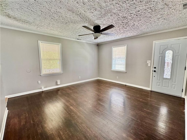 312 E Broad St, Winder, GA 30680 - foyer with a ceiling fan, wood finished floors, crown molding, and baseboards