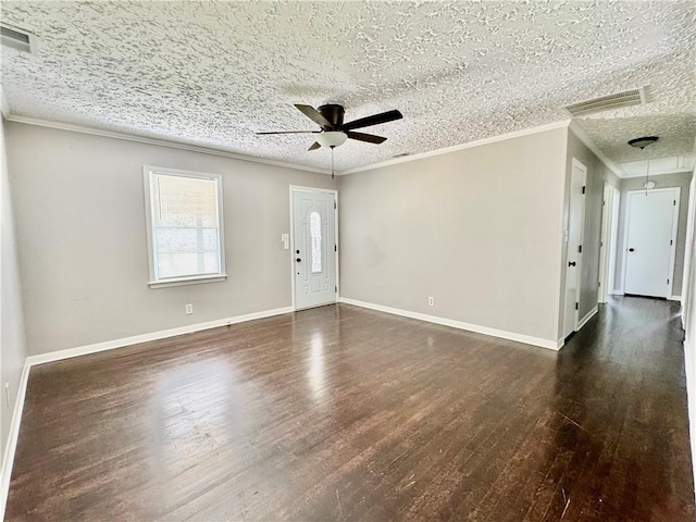 312 E Broad St, Winder, GA 30680 - unfurnished room with ceiling fan, dark wood-style floors, crown molding, attic access, and baseboards