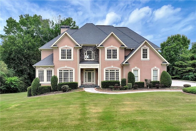 view of front of house with a front yard