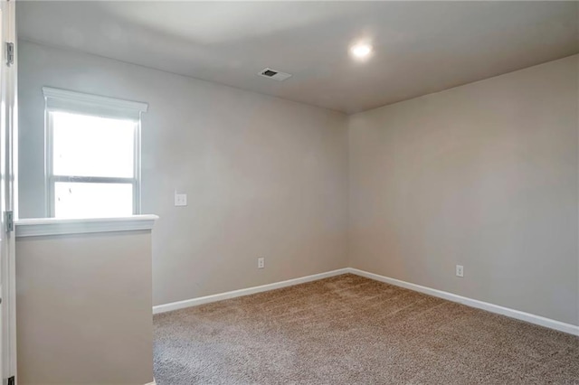 empty room with carpet floors