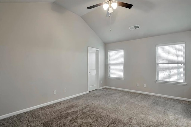 empty room featuring carpet, lofted ceiling, and ceiling fan