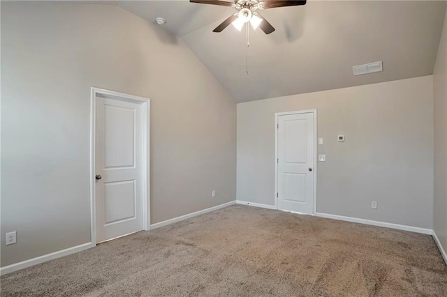 unfurnished room featuring ceiling fan, light colored carpet, and lofted ceiling