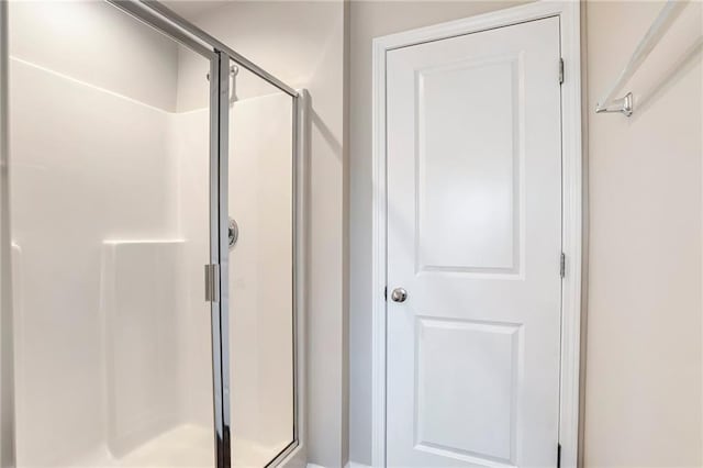 bathroom featuring an enclosed shower