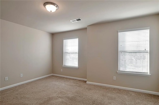 view of carpeted spare room