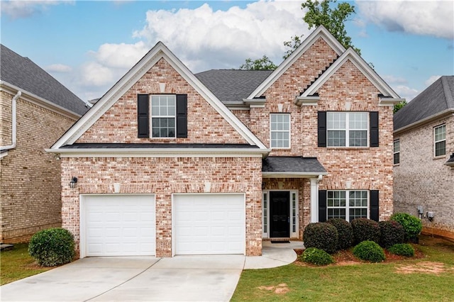 1076 Scenic Park Trl, Lawrenceville, GA 30046 - view of front facade featuring concrete driveway, brick siding, and a front lawn