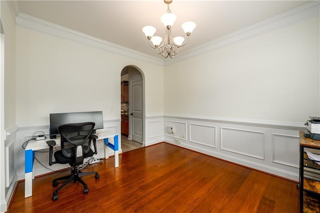 1076 Scenic Park Trl, Lawrenceville, GA 30046 - office area featuring arched walkways, ornamental molding, a chandelier, wood finished floors, and a wainscoted wall