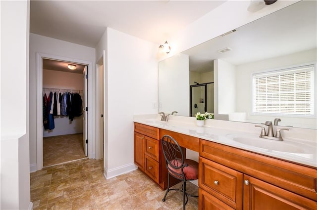 1076 Scenic Park Trl, Lawrenceville, GA 30046 - full bath with a stall shower, double vanity, a walk in closet, and baseboards