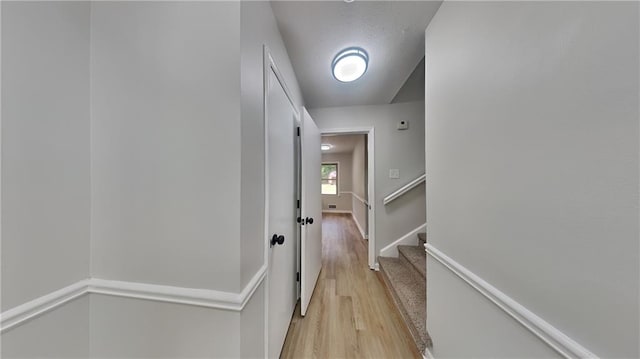 1102 Tony Valley Dr, Conyers, GA 30013 - hallway with light wood-style floors and baseboards