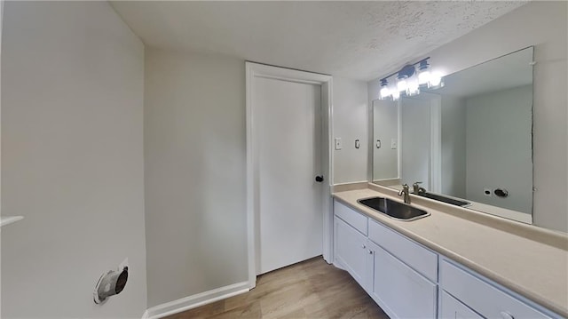 1102 Tony Valley Dr, Conyers, GA 30013 - bathroom featuring vanity and wood finished floors