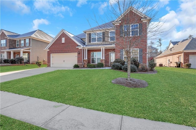 view of front facade with a garage and a front yard