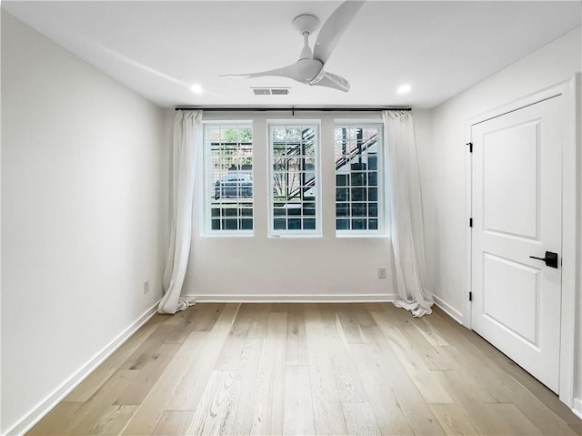 371 Pratt Dr SE Unit 203, Atlanta, GA 30315 - spare room featuring light wood-style floors, visible vents, baseboards, and ceiling fan