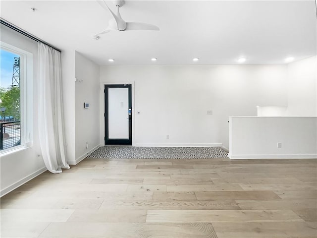 371 Pratt Dr SE Unit 203, Atlanta, GA 30315 - spare room featuring baseboards, light wood-style floors, recessed lighting, and a ceiling fan