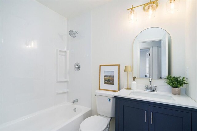 full bathroom featuring vanity, toilet, and bathing tub / shower combination