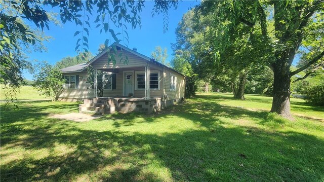 exterior space with a front yard