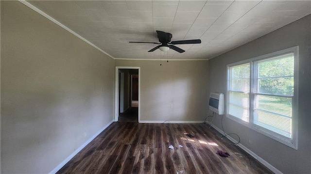 empty room featuring ceiling fan, hardwood / wood-style floors, a wall mounted air conditioner, and ornamental molding