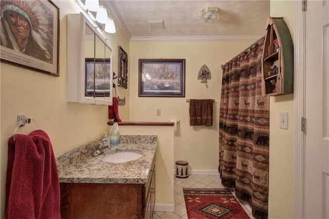 bathroom with vanity, a textured ceiling, crown molding, tile patterned flooring, and curtained shower