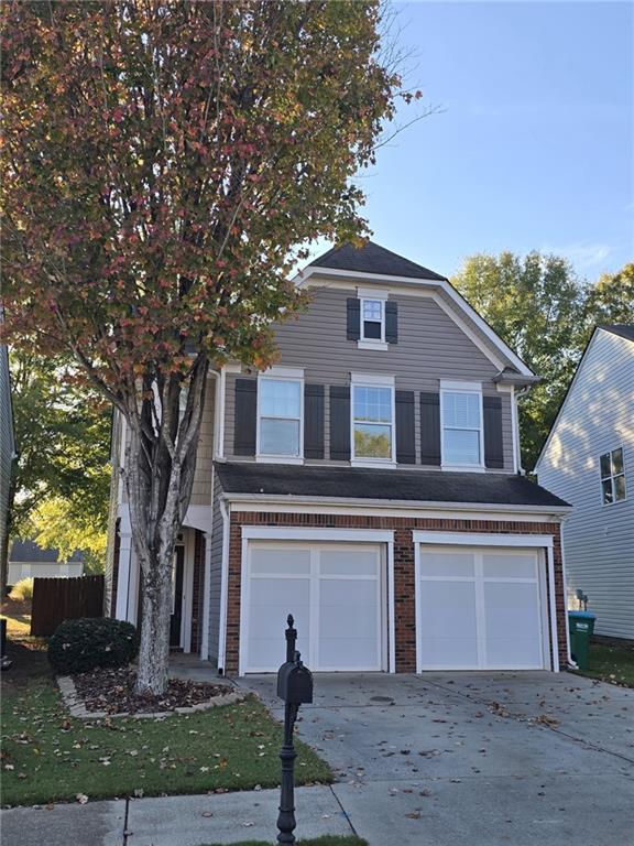 front of property with a garage