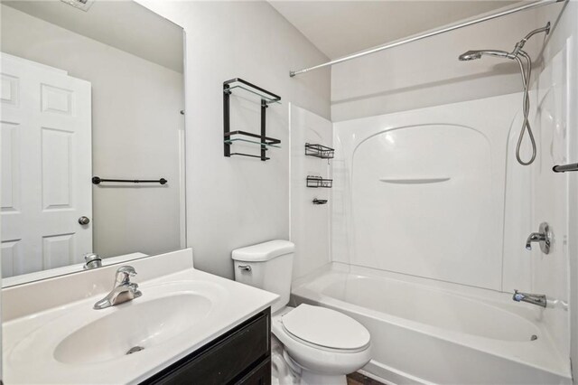 2726 Pierce Brennen Ct, Lawrenceville, GA 30043 - bathroom featuring vanity, bathing tub / shower combination, and toilet