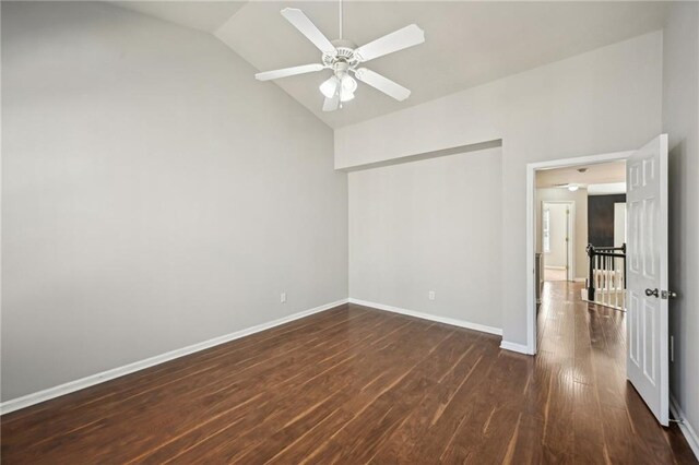2726 Pierce Brennen Ct, Lawrenceville, GA 30043 - unfurnished bedroom featuring lofted ceiling, dark wood-style floors, baseboards, and ceiling fan