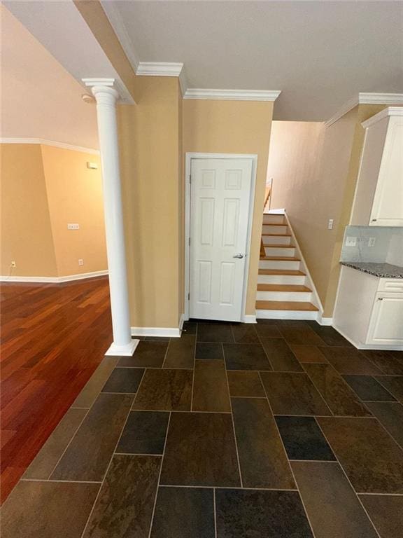 3381 Walkers Ridge Rd, Dacula, GA 30019 - foyer entrance with decorative columns, baseboards, ornamental molding, and stairway