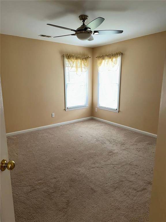3381 Walkers Ridge Rd, Dacula, GA 30019 - carpeted spare room with baseboards and ceiling fan