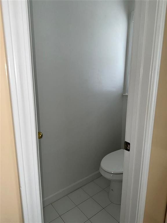 3381 Walkers Ridge Rd, Dacula, GA 30019 - bathroom with tile patterned flooring, toilet, and baseboards