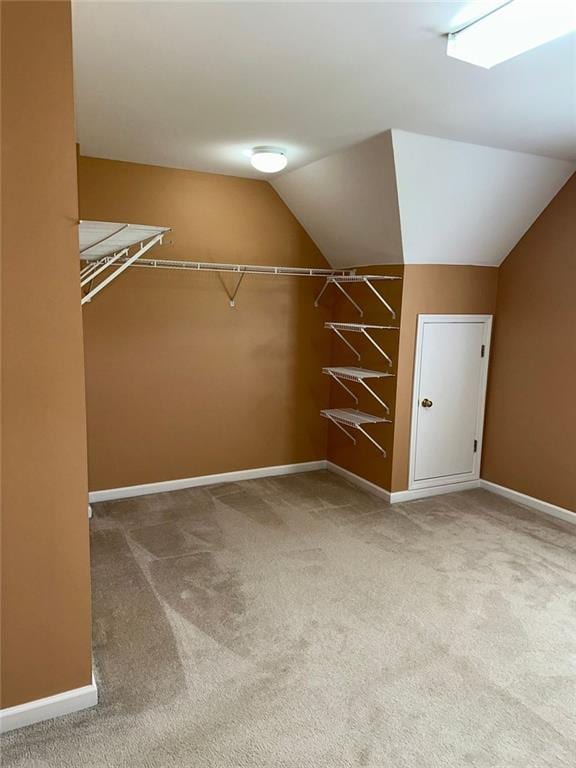 3381 Walkers Ridge Rd, Dacula, GA 30019 - walk in closet featuring carpet and vaulted ceiling