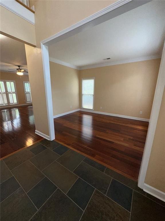 3381 Walkers Ridge Rd, Dacula, GA 30019 - spare room with ornamental molding, wood finished floors, baseboards, and a ceiling fan